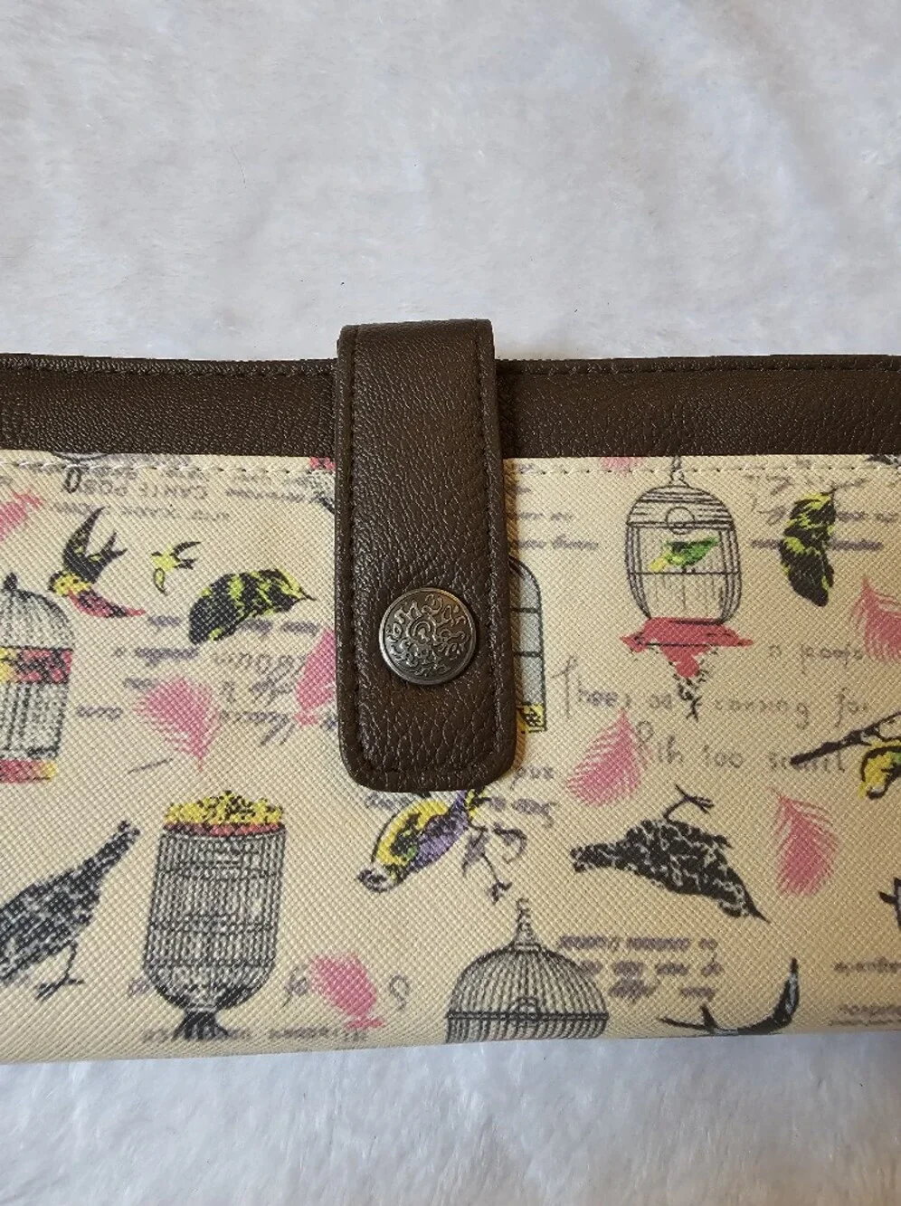 Relic Beige Canvas Wristlet Clutch with Brown Trim and Birdcage Print
